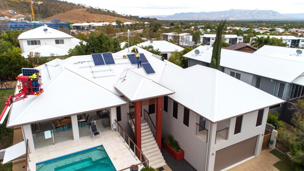 Horan & Bird installing solar panels on the roof of a house